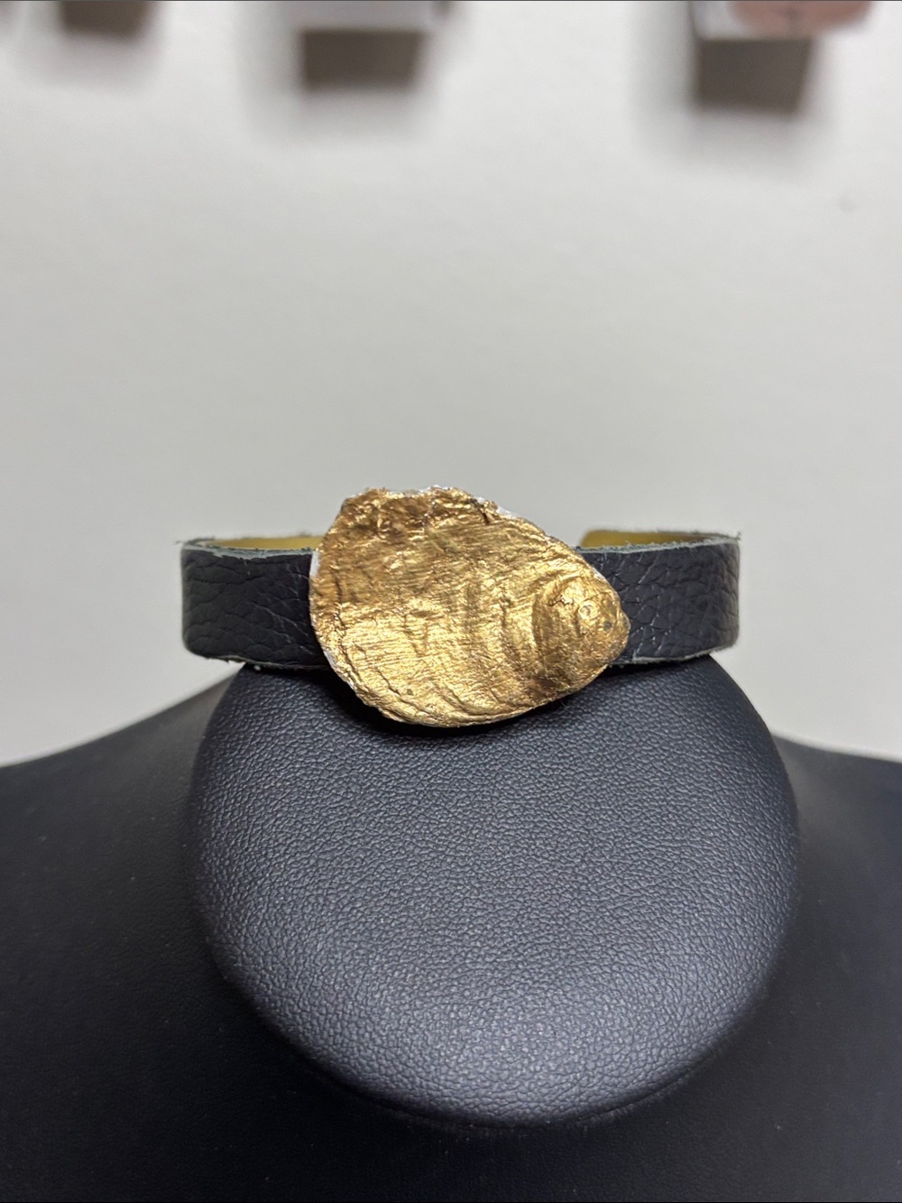 Black Leather Cuff Bracelet with Gold Shell Accent